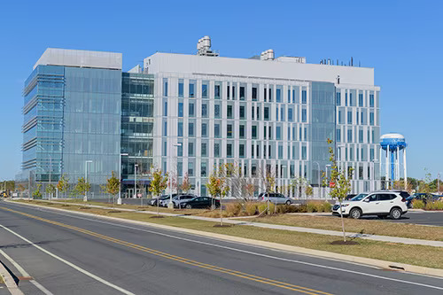 A veiw of the Ammon Pinizzotto Biopharmaceutical Innovation Center building, which houses NIIMBL's headquarters